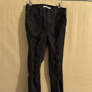 Levi’s 720 Black ripped skinny jeans